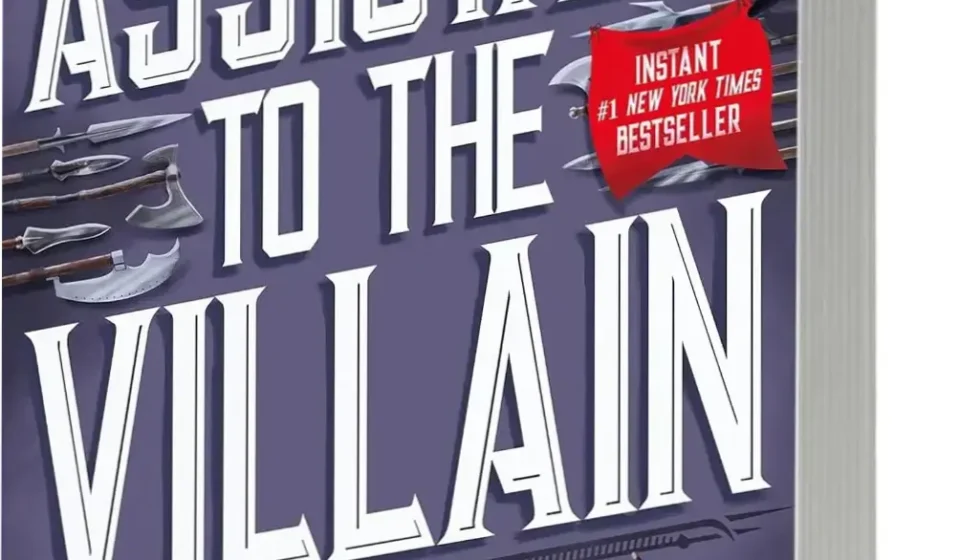 The paperback cover of Assistant to the Villain by Hannah Nicole Maehrer