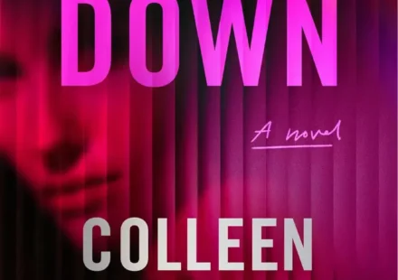 Cover of Woman Down novel by Colleen Hoover displayed on a digital ebook reader